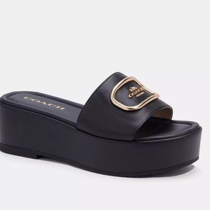 Coach platform sandals. Worn once. Original box included.